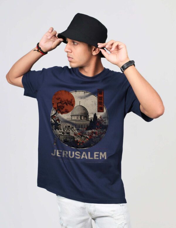 Start your journey of resistance and pride with the powerful Jerusalem T Shirt Palestine – a bold fashion statement rooted in faith, identity, and heritage. This t-shirt is not just apparel – it’s a message of strength, solidarity, and spiritual connection. The powerful artwork of Masjid Al-Aqsa (Dome of the Rock) stands as a centerpiece, making this the ultimate Jerusalem T Shirt Palestine for those who wish to wear their beliefs with confidence. This premium oversized Palestine t shirt is made for comfort and impact. Crafted with high-quality breathable cotton, it is perfect for streetwear, cultural events, or even as a casual everyday fit. The t-shirt blends Islamic values and artistic freedom with modern fashion, appealing to the global youth movement supporting Palestinian freedom. In the center of the design, the Dome of the Rock is printed with raw texture and earthy tones, paired with the text "Jerusalem" in bold, distressed font. It symbolizes resistance, resilience, and remembrance. Whether you’re attending Friday prayers, a protest, or simply walking the city streets, this Jerusalem T Shirt Palestine speaks volumes without saying a word. Muslim youth around the world are embracing cultural identity through fashion. That’s why this Islamic t shirt isn’t just made for wear – it’s made for purpose. The message of a Free Palestine T Shirt in India or anywhere else is now global. Represent your culture, your faith, and your voice through bold apparel that stands up for justice and unity. In every thread and print, this Jerusalem T Shirt Palestine reminds the world: Palestine is not forgotten. From the spiritual heart of Jerusalem to the voices of youth worldwide.